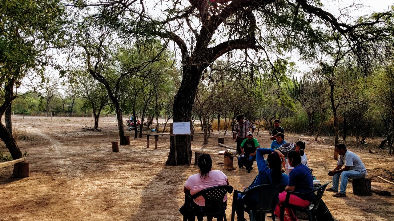 community members sitting outside 