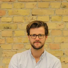 Christopher Bren d'Amour Headshot