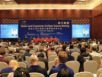 Attendees at third Open Science Meeting listening to speaker at front of room